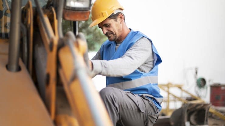 man using excavator digging day light
